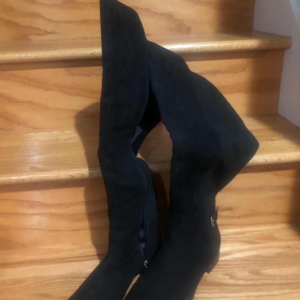 Knee boots still in box